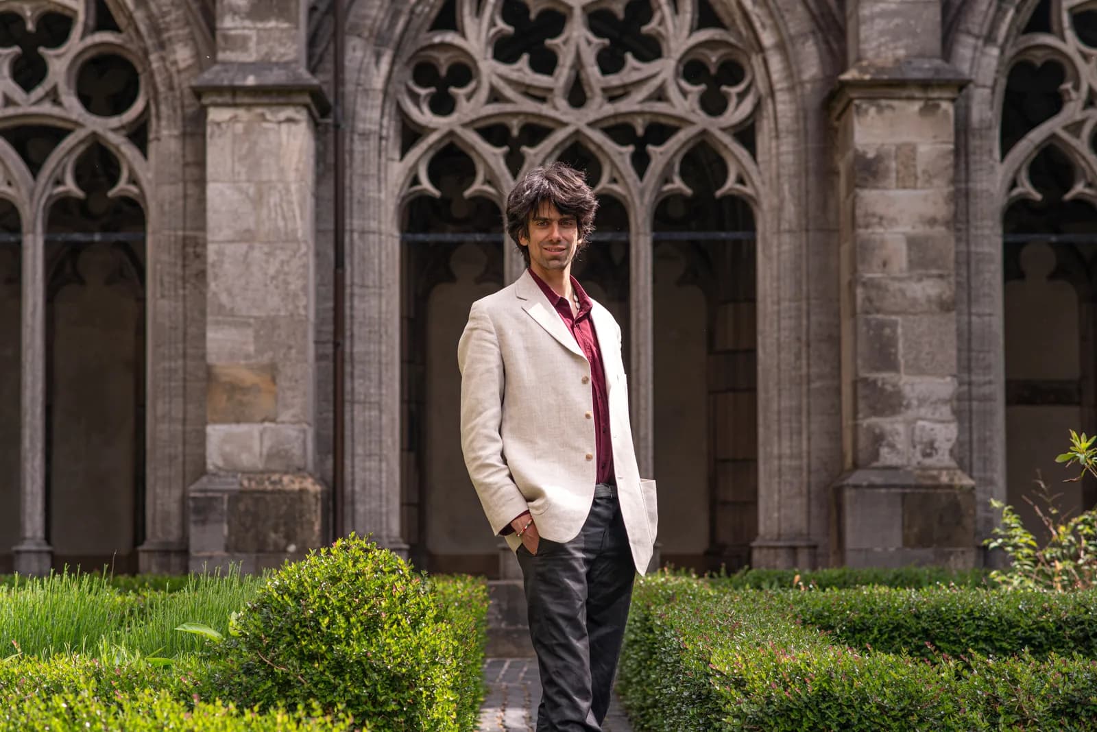 John Akerman Özgüç, founder of Aquinox Media, in the Dom cloister garden in Utrecht